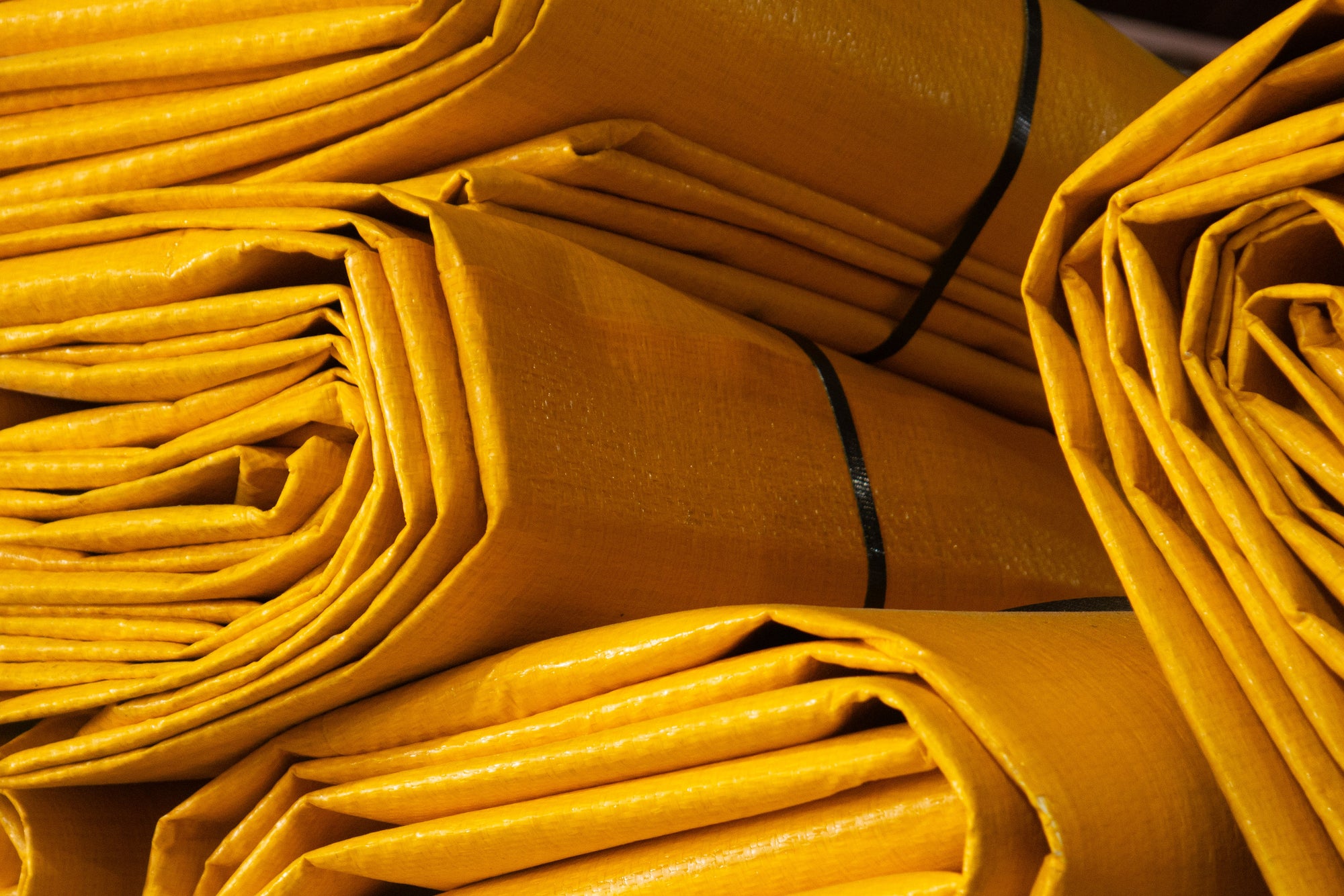 Yellow Pro-Flex Berm rolled up for storage