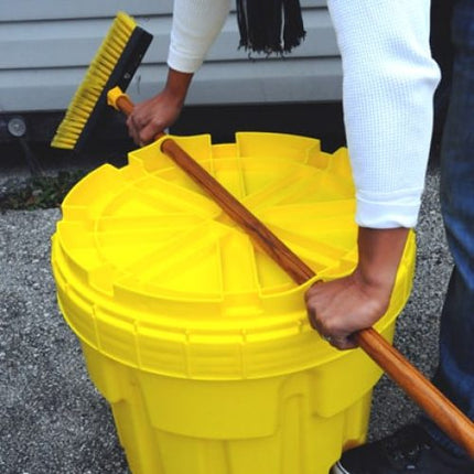 Yellow Ultra-Overpack Plus with a man attaching a broom to the lid