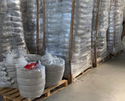 Several pallets of interlocking booms