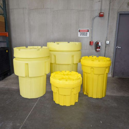 A set of yellow polyethylene spill containment drums with no drain, arranged in two rows with varying sizes displayed in a facility.