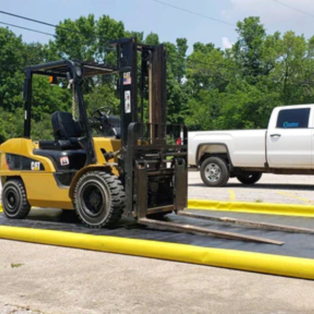 A ProFlex Foam Wall Berm with a forklift on it