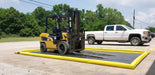A ProFlex Foam Wall Berm with a forklift on it