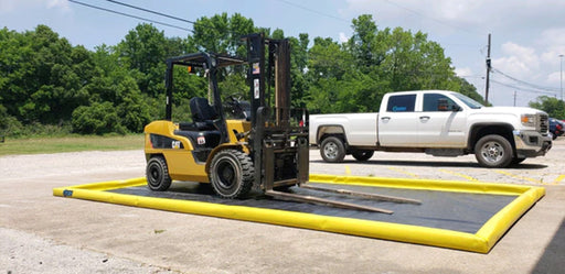 A ProFlex Foam Wall Berm with a forklift on it