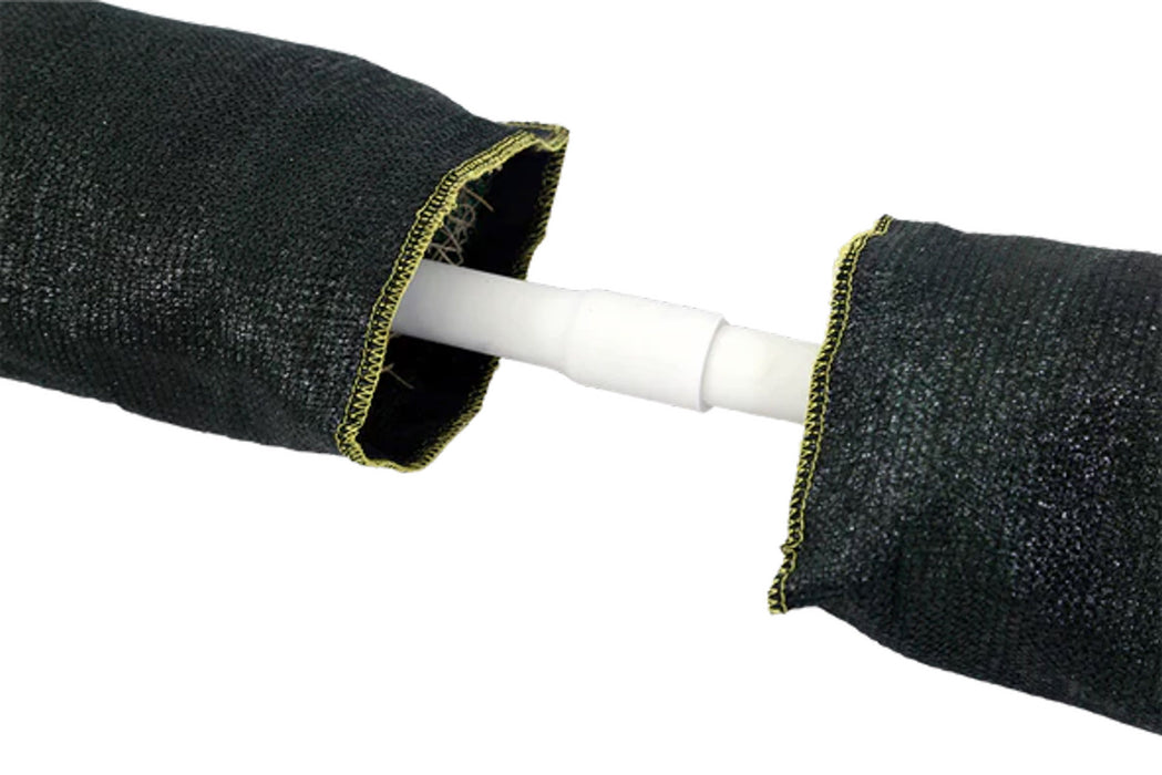 The inside of a Spill Bully Curb Inlet filter with white pipe and fabric over it