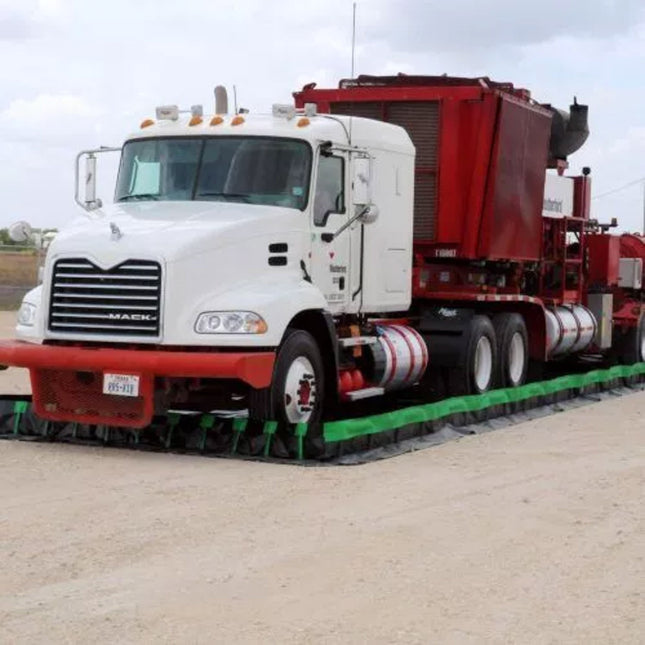 An 18 wheeler inside a Ultra-Containment Berm Ultimate Model