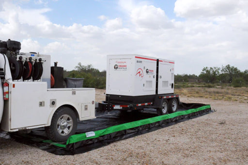 A work truck backing a mini-trailer into a Ultra-Collapsible Berm