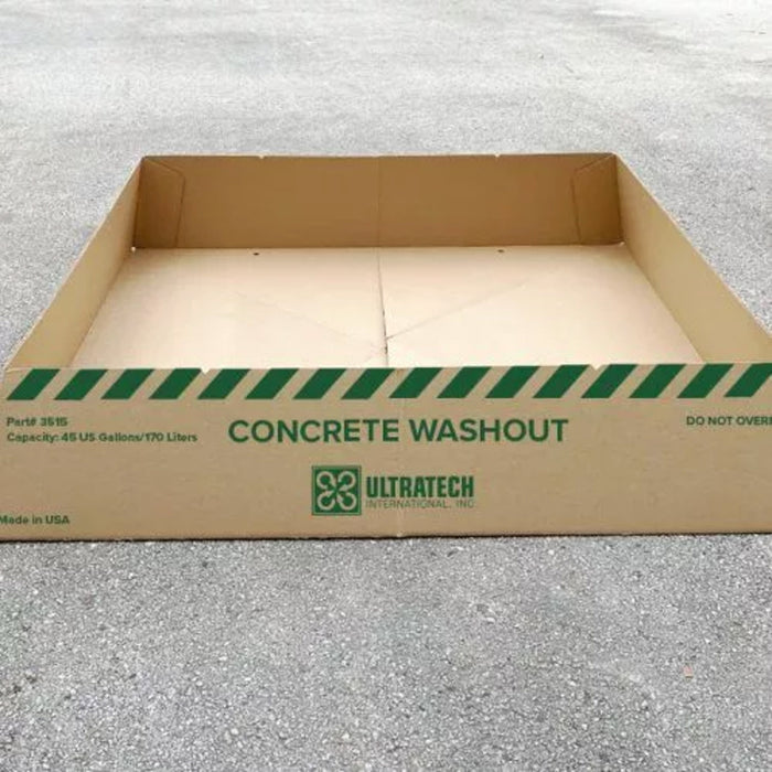 A cardboard box with shallow sides, used as a concrete washout berm economy model