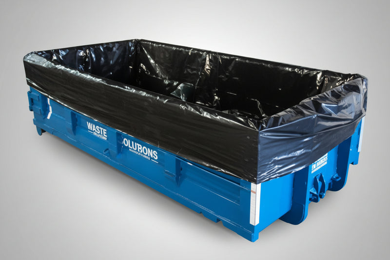 An large orange dumpster with a black liner in it